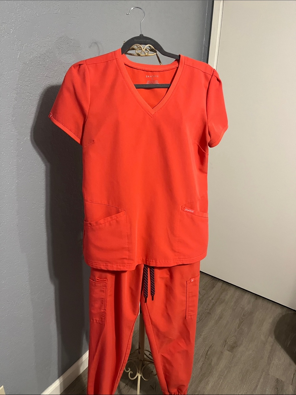 Jaanuu Women’s V-Neck Scrub Set in Bright Coral